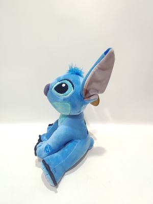 Le jouet de peluche parlant assis Stitch est mignon, avec des hauteurs de 7,09 pouces et 11,02 pouces