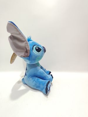 Le jouet de peluche parlant assis Stitch est mignon, avec des hauteurs de 7,09 pouces et 11,02 pouces