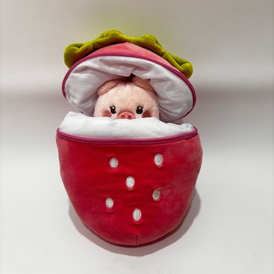 Des jouets en peluche avec fermeture à glissière en forme de fraise