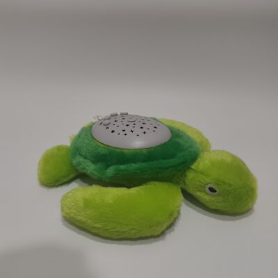 Le projecteur de tortue en peluche