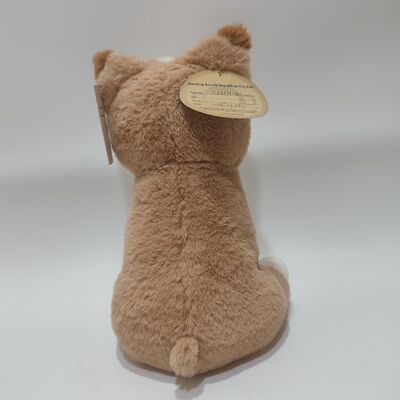 Chien en peluche chauffé avec une poche de haricots d'argile à l'intérieur