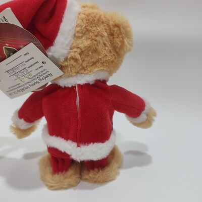 L'ours de Noël chante et marche avec de la musique et du mouvement