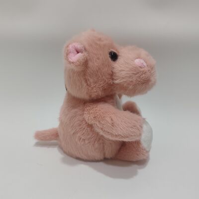 Un hippopotame qui parle doux et caressé, animal de peluche, à vendre