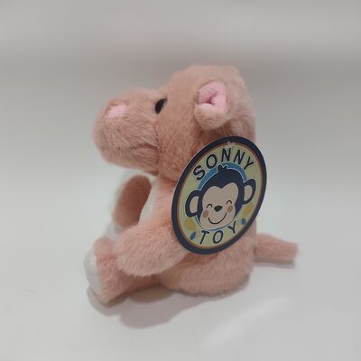 Un hippopotame qui parle doux et caressé, animal de peluche, à vendre