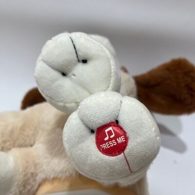 Joli jouet en peluche pour chien dansant avec des fonctionnalités musicales amusantes.