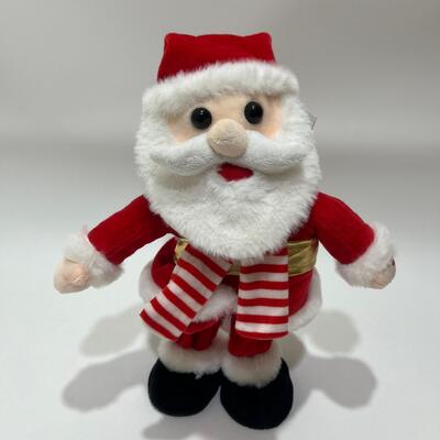 Peluche Père Noël chantant et dansant avec musique